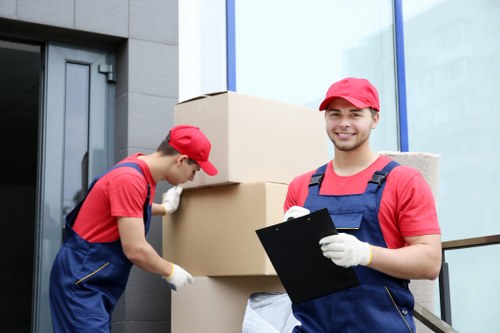 Movers navigating stairs and access challenges in Nunhead