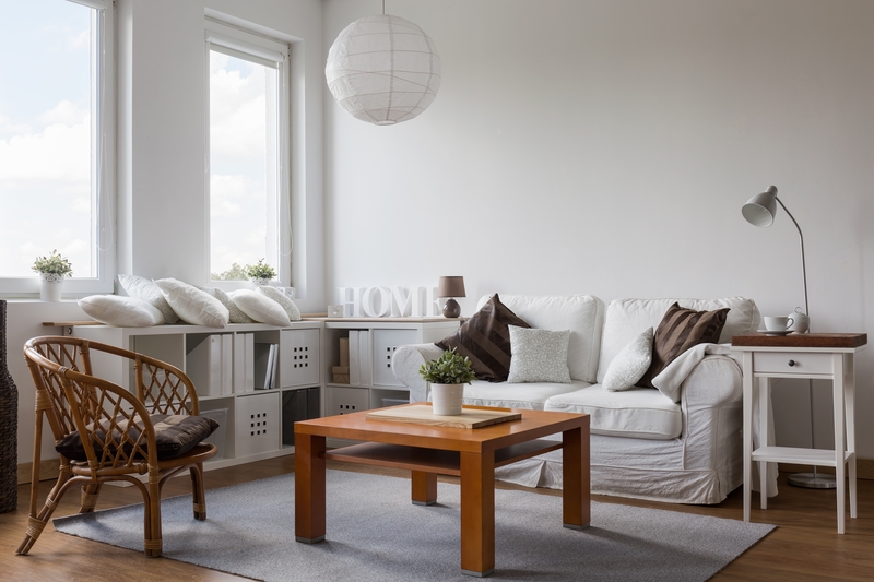 Removal team handling furniture and boxes in South East London
